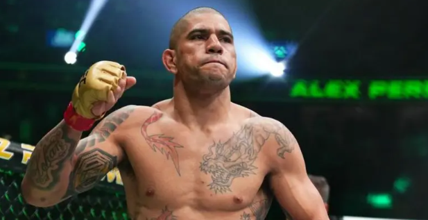 Alex Pereira enters the octagon with taped fists raised, showing confidence and focus. The image connects to his upcoming UFC 320 rematch against Magomed Ankalaev in Las Vegas.
