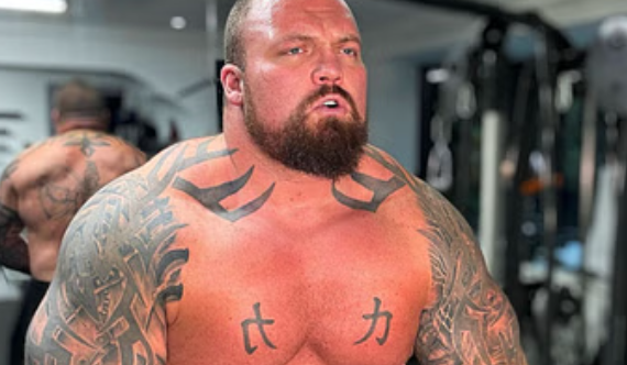 Eddie Hall shirtless in the gym during weight cut prep, showing his commitment to the Dillon Danis Eddie Hall fight and upcoming MMA challenge.
