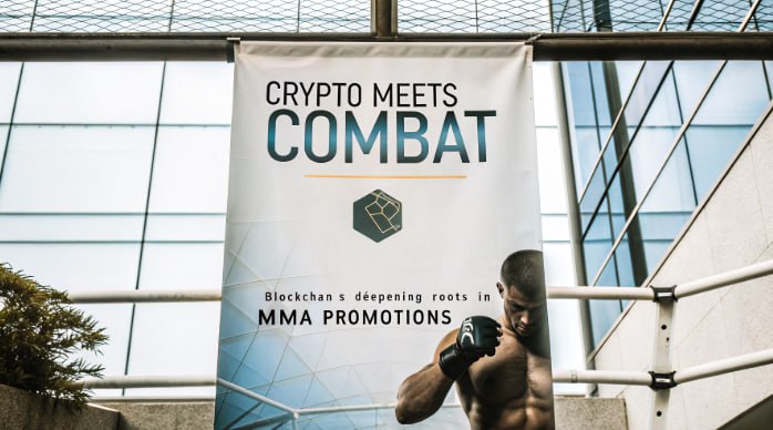 Banner reading Crypto Meets Combat promoting blockchain’s role in MMA promotions, with a fighter pictured in gloves.